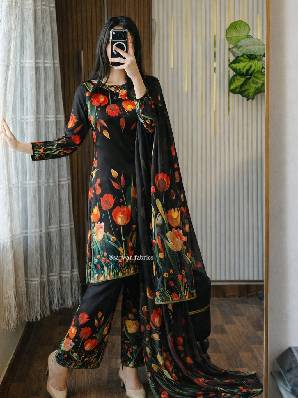 Model wearing a black suit with orange tulips – digital printed silk 3-piece suit