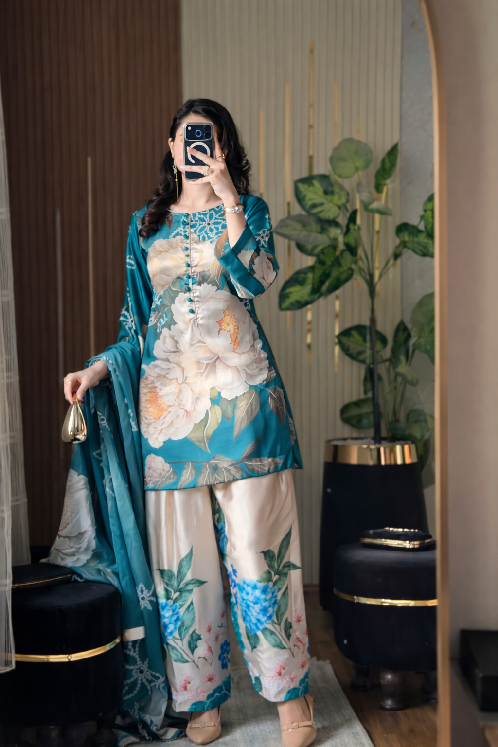 Model wearing a teal suit with cream flowers – digital printed silk 3-piece suit