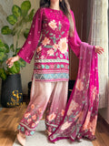 Model wearing a magenta floral suit with a pink dupatta – digital printed silk 3-piece suit