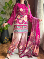 Model wearing a magenta floral suit with a pink dupatta – digital printed silk 3-piece suit