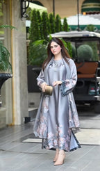 Model wearing a grey long kurta with a floral border and dupatta – digital printed silk 3-piece suit