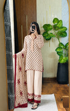 Model wearing a cream suit with maroon polka dots and a printed dupatta – digital printed silk 3-piece suit