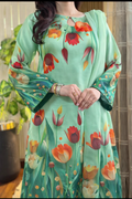 Model wearing a mint green suit with red tulips – digital printed silk 3-piece suit