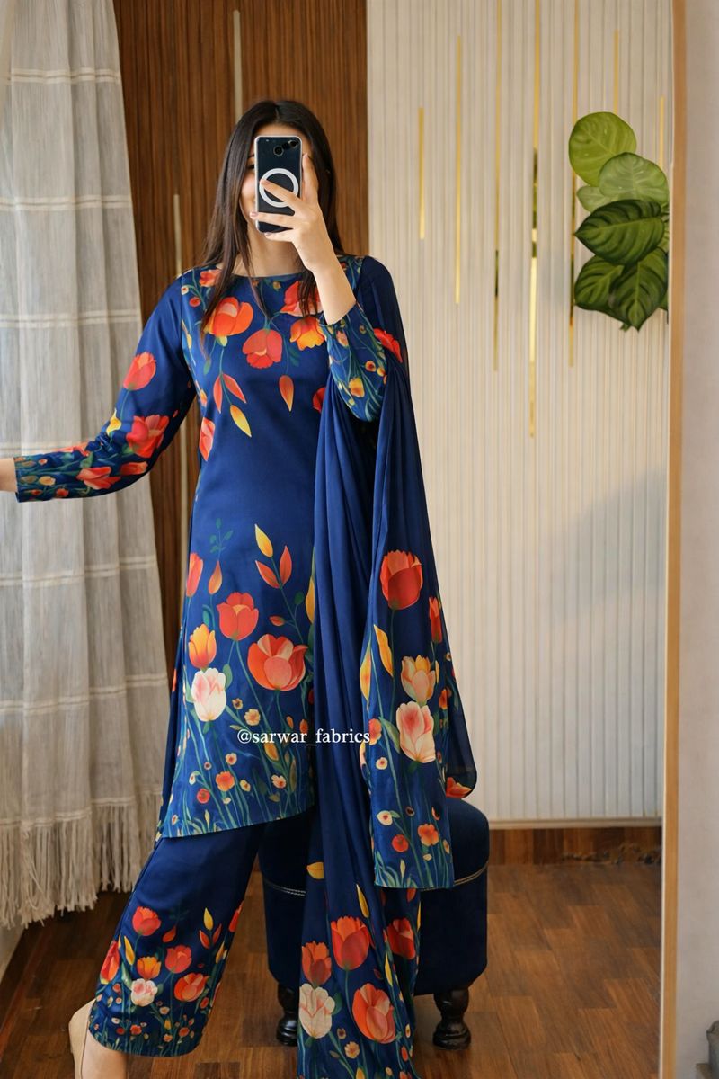 Model wearing a navy suit with red and orange tulips and a navy dupatta – digital printed silk 3-piece suit