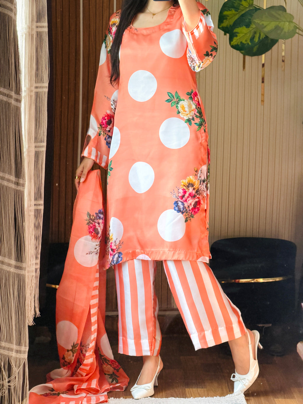 Model wearing a peach kurta with white polka dots and striped trousers – digital printed silk 3-piece suit