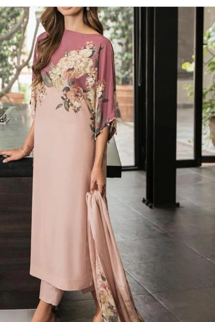 Model wearing a dusty pink kurta with a floral panel and dupatta – digital printed silk 3-piece suit