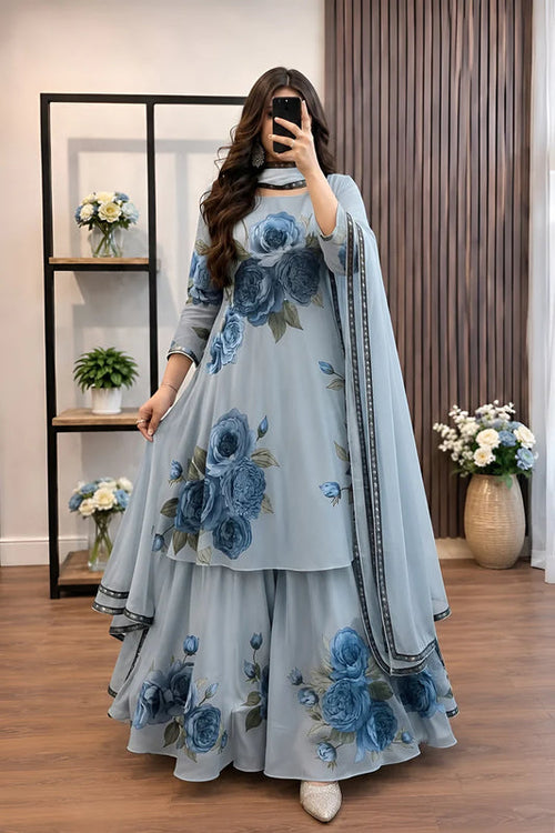 Model wearing a powder blue flared set with blue roses – digital printed silk 3-piece suit