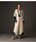 Model wearing an ivory kurta with black detailing at the hem – digital printed silk 3-piece suit