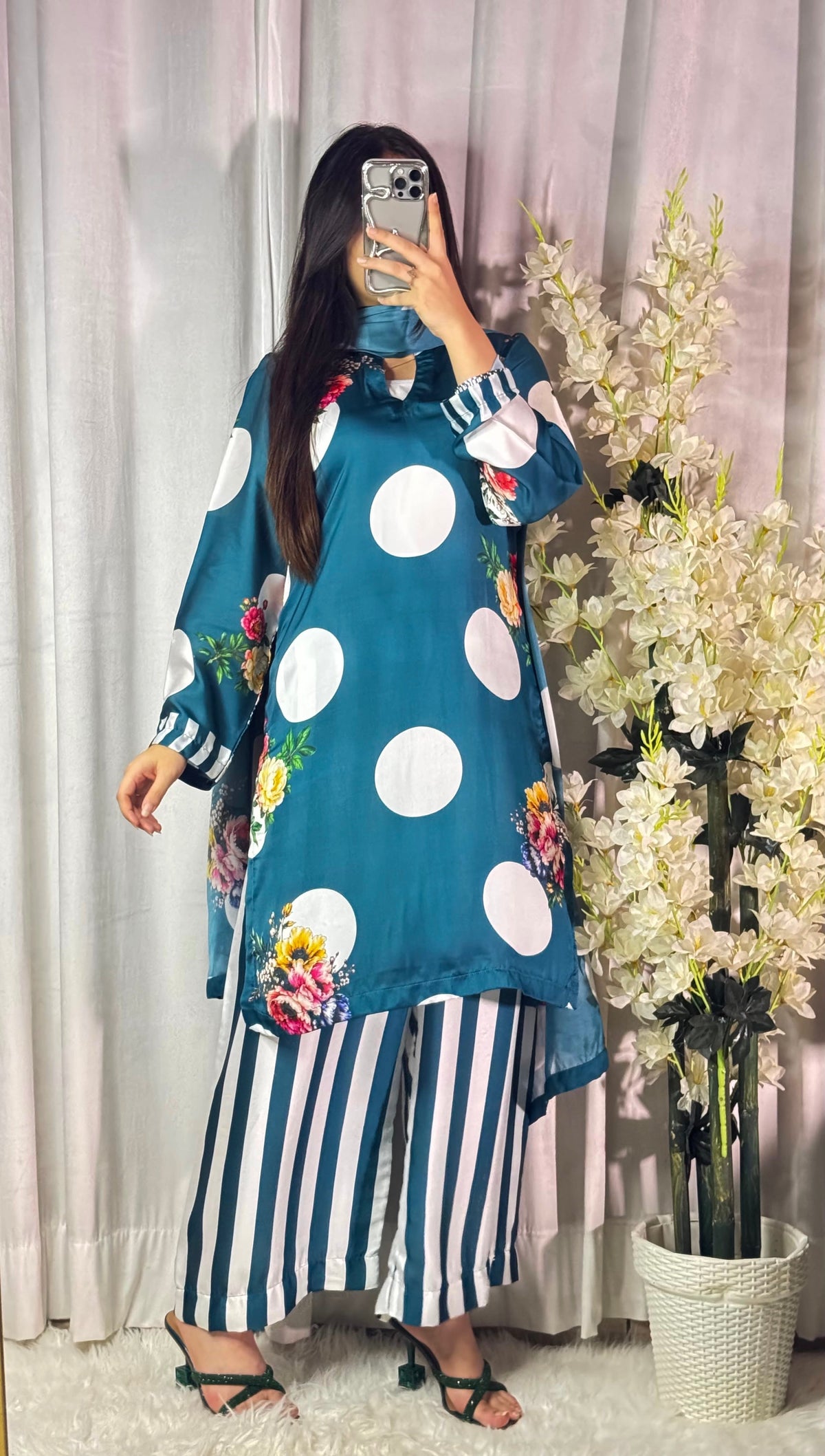 Model wearing a teal kurta with large white polka dots and striped palazzo trousers – digital printed silk 3-piece suit